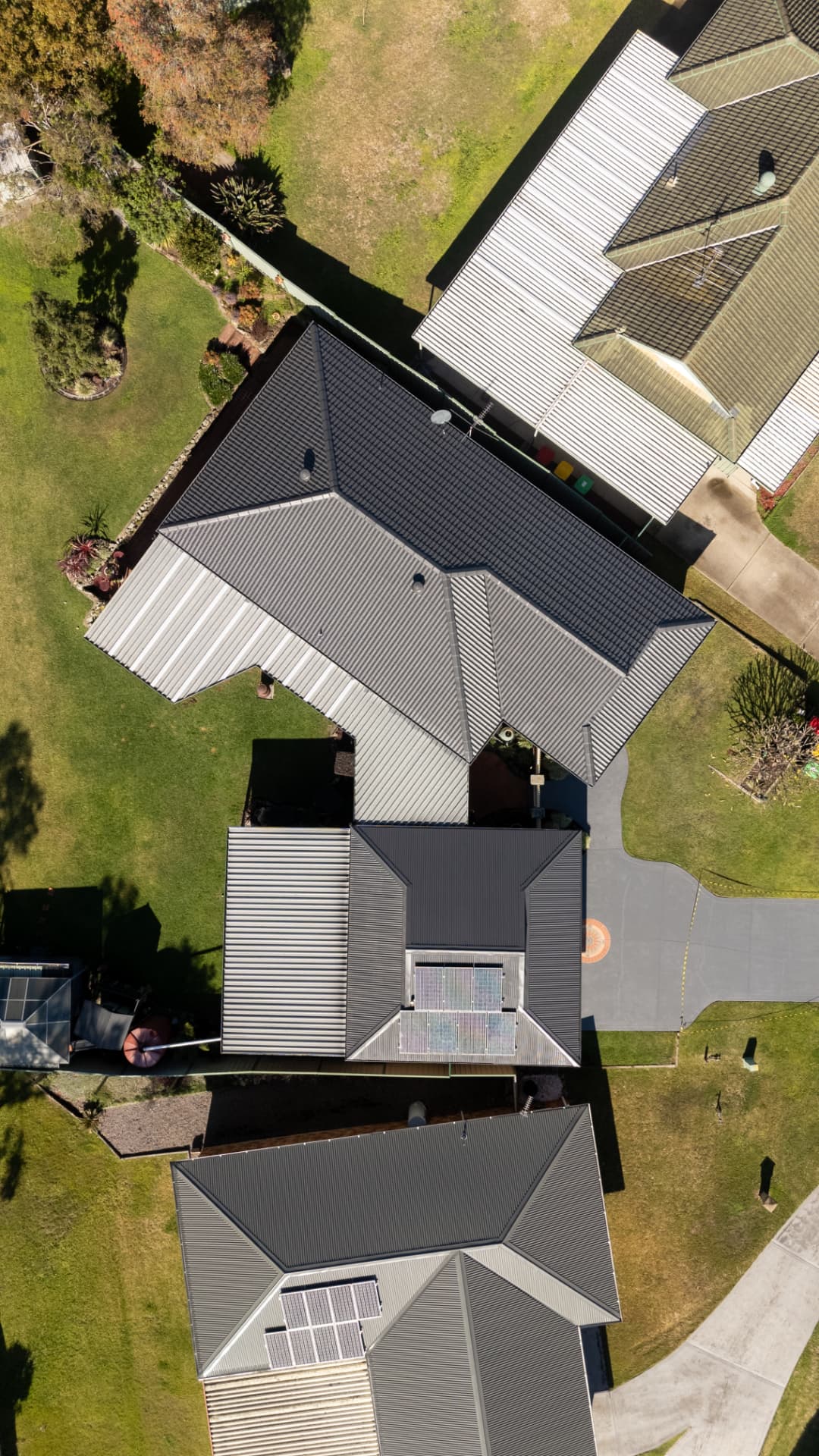 Aerial view of a completed charcoal roof coating